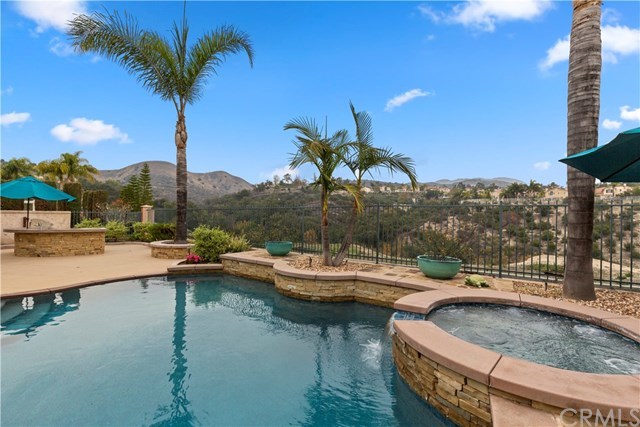 16 Flores Lake Forest, CA 92610 - Photo 11 of 24 The pool and spa were just redone two years ago with pebble tea, planters, stacked stone and beautiful, forever views.
