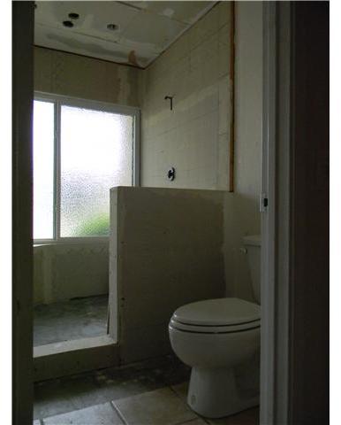 2355 Caringa Way, Unit 4 Carlsbad, CA 92009 - Photo 14 of 25 Unfinished bath set up for two shower heads. New window installed, bath has lots of potential.