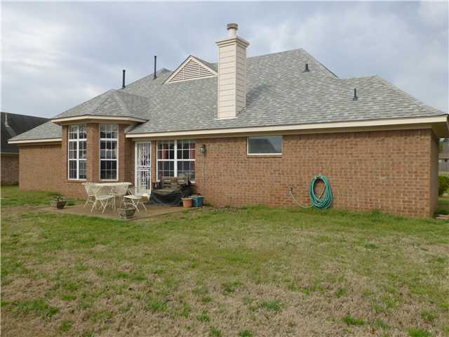 4940 Misty River Road Bartlett, TN 38135 - Photo 18 of 20 The home has a rear patio for outdoor cooking and entertaining.