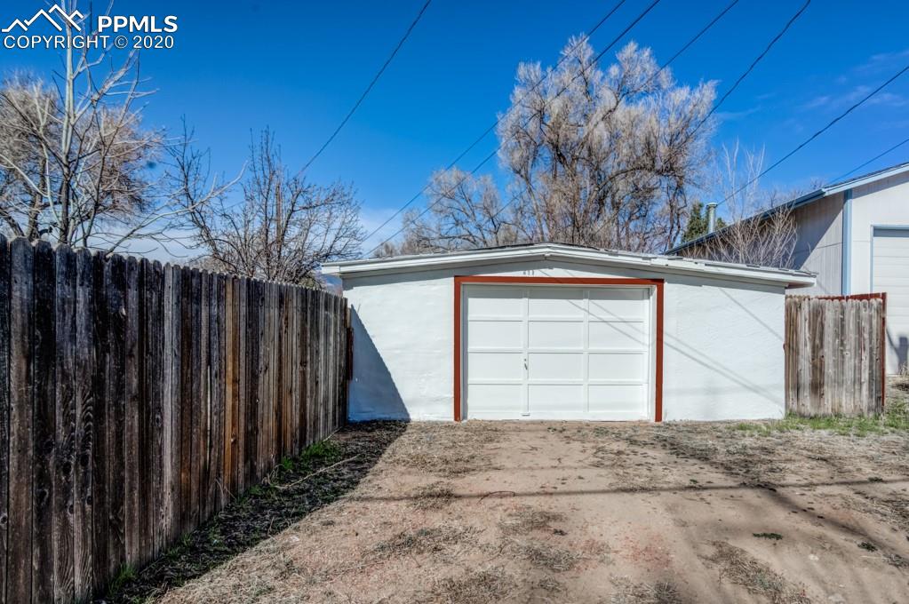 611 Prairie Road Colorado Springs, CO 80909 - Photo 17 of 18 There is a paved alley access to the detached garage.