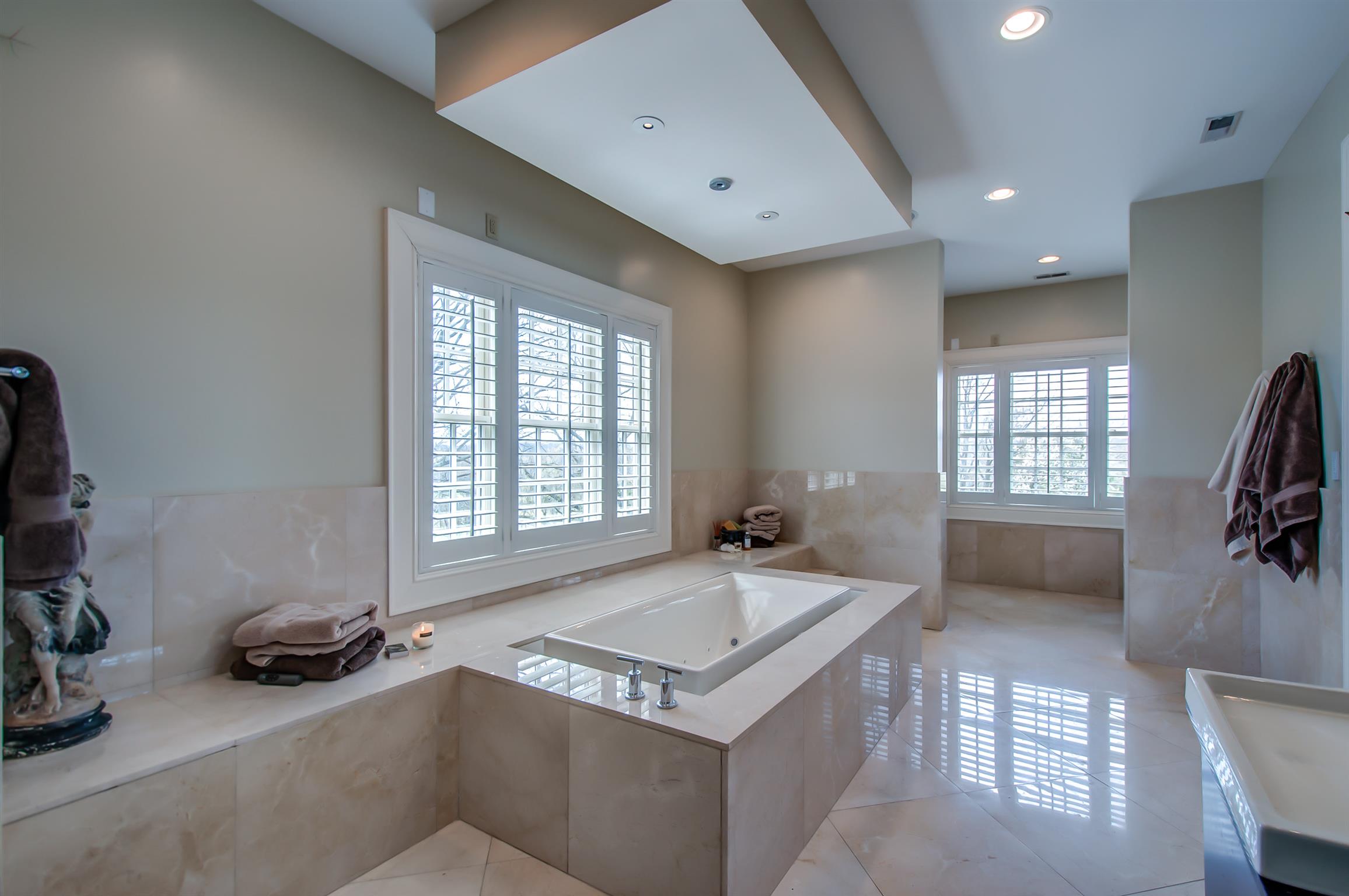 340 Kinnie Road Franklin, TN 37069 - Photo 18 of 28 View of master bathroom showing the water closet area with bidet & additional vanity. Great natural light!
