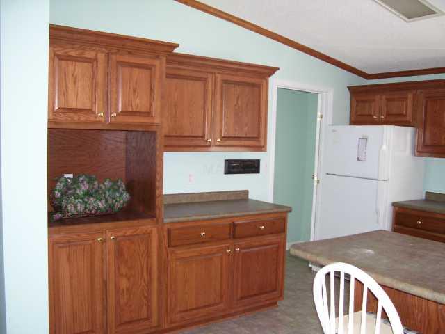 4059 Kerr Road Millington, TN 38053 - Photo 8 of 10 New Cabinets, new floor, new counter tops, new paint. Off kitchen, laundry room with dedicated space for your freezer.