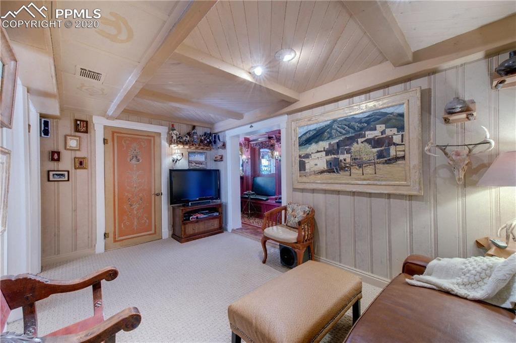 7955 Highway 24 Cascade, CO 80809 - Photo 23 of 36 The sauna is accessed from the door in the family room.