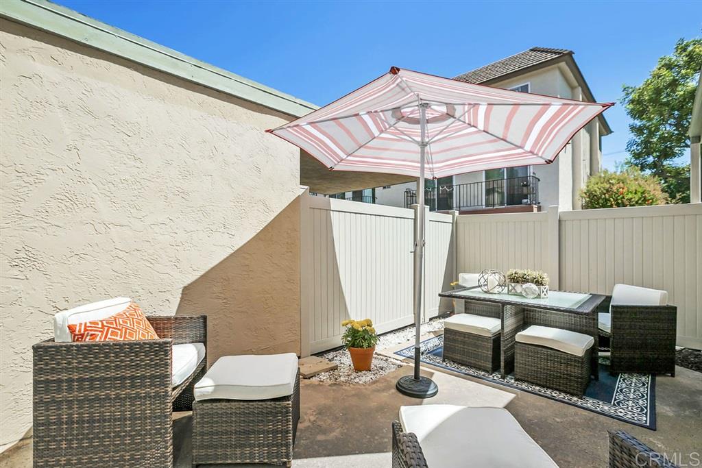 7855 Hummingbird Lane San Diego, CA 92123 - Photo 16 of 25 Enjoy San Diego's beautiful weather all year from one of two patio. The back patio is accessible from the living room and the carport area.
