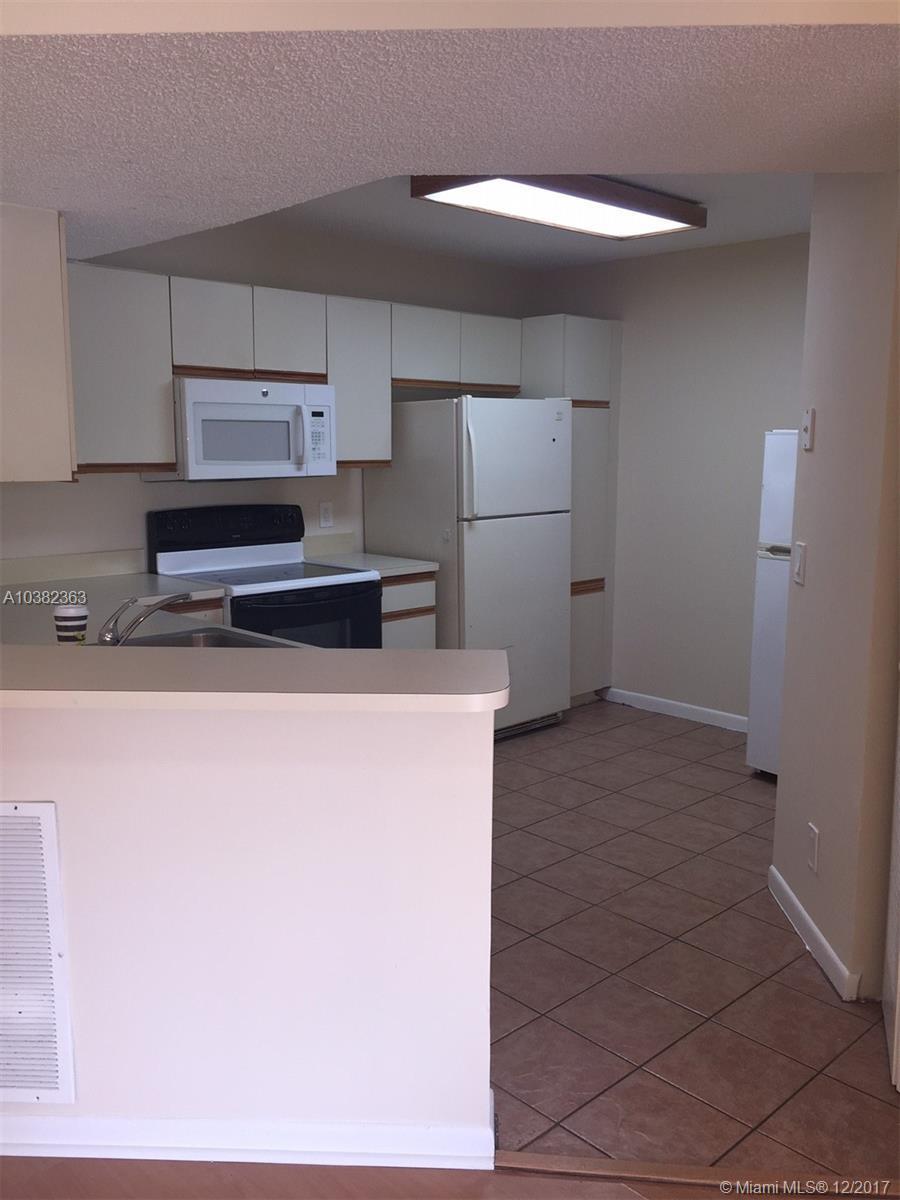 8891 Wiles Road, Unit 106 Coral Springs, FL 33067 - Photo 6 of 10