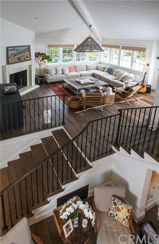 326 Ruby Street Laguna Beach, CA 92651 - Photo 8 of 20 Elevated Family Room Open to Kitchen and Dining Below.