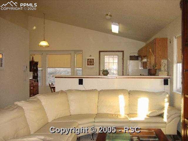 4739 Brant Road Colorado Springs, CO 80911 - Photo 4 of 8 Large family area that can easily be separated into a dining area and a family room area