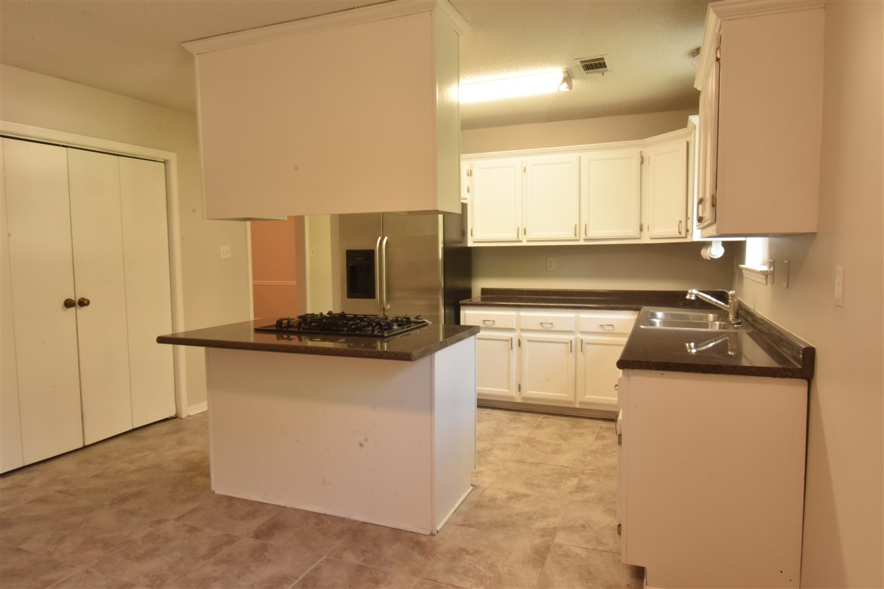 629 Talley Road Atoka, TN 38004 - Photo 6 of 25 Plenty of cabinet space, and an additional pantry.