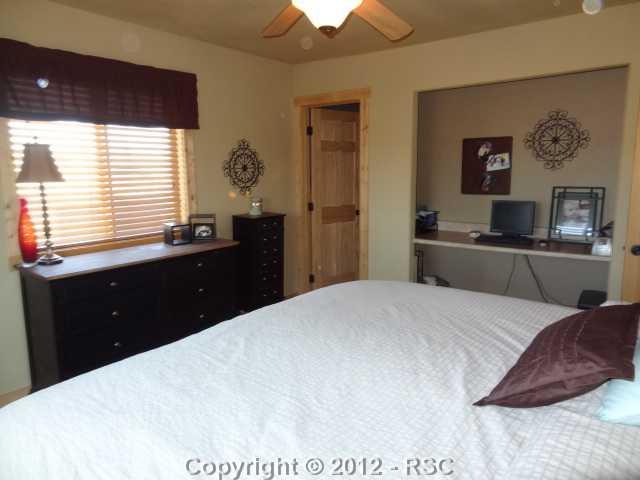 29 Ridge Point Circle Divide, CO 80814 - Photo 9 of 16 Master bedroom with attached 3/4 bath, and walk-in closet
