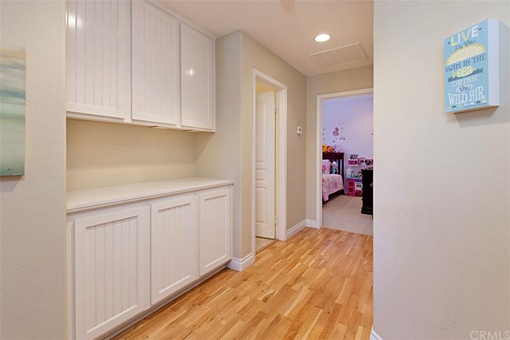 605 Corte Calmo San Clemente, CA 92673 - Photo 22 of 27 Lower level hallway.