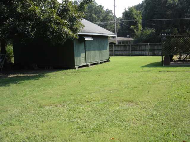 1386 South Perkins Road Memphis, TN 38117 - Photo 9 of 10 Huge Backyard with 19 x 18 Wired Storage/Workshop