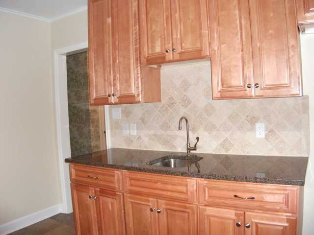5098 North Angela Road Memphis, TN 38117 - Photo 6 of 11 Granite counters/Wet bar area' Previously washer/dryer area