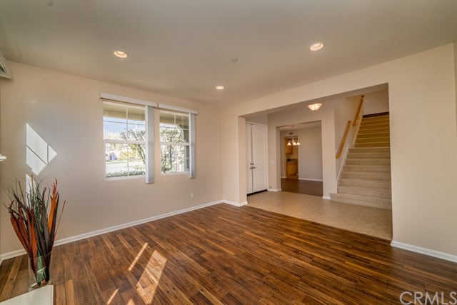 5473 Stoneview Road Rancho Cucamonga, CA 91739 - Photo 3 of 56 Living room with recessed lighting, new laminate flooring