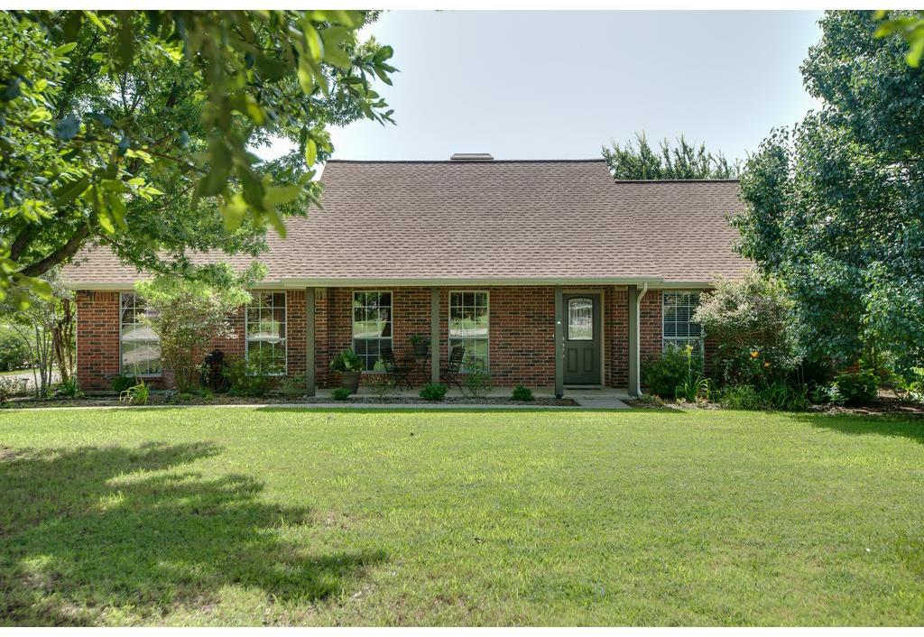 429 Ben Boyd Road Argyle, TX 76226 - Photo 1 of 1 Attractive curb appeal with yard full of mature trees mature trees.
