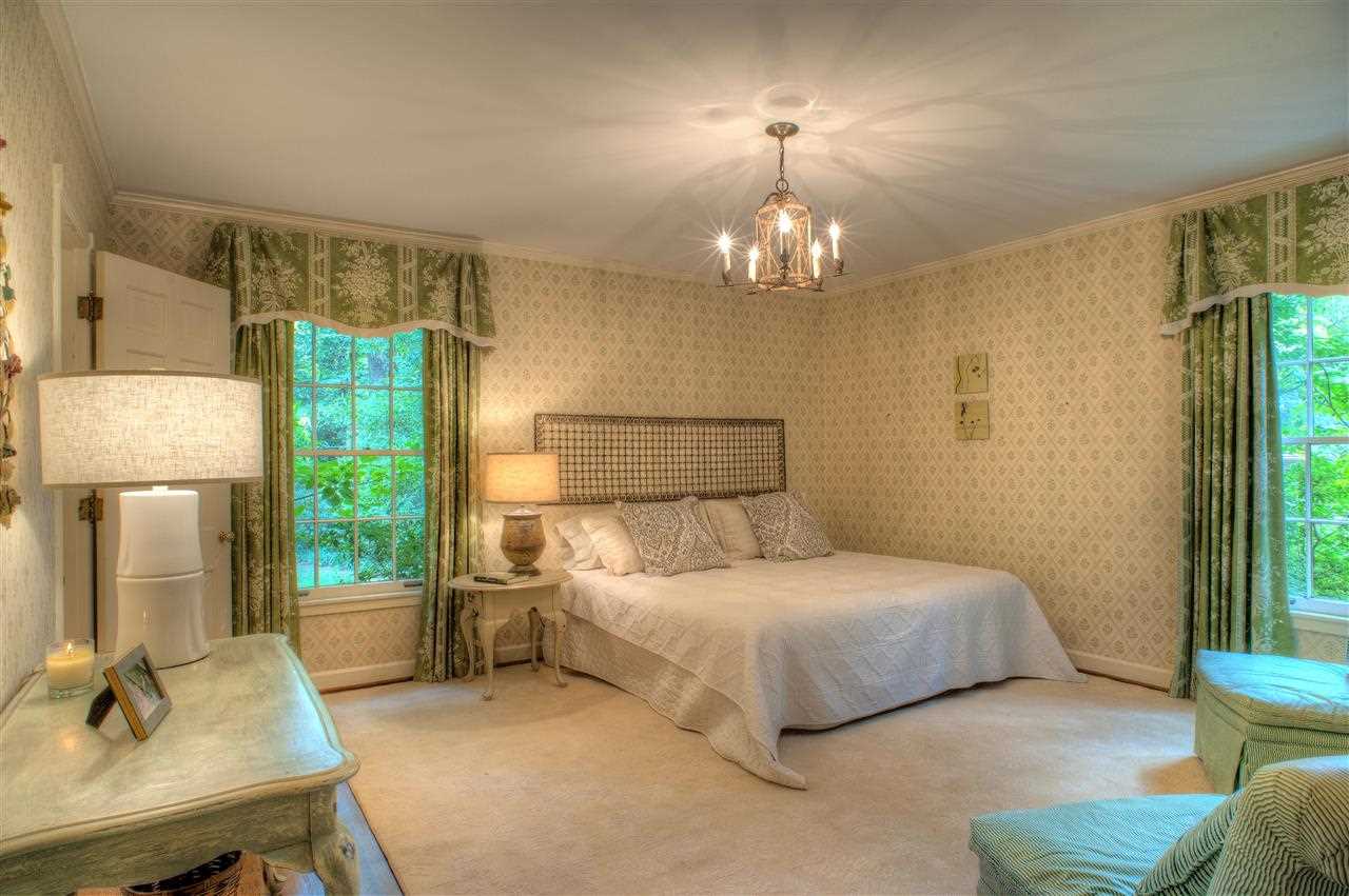 5439 North Angela Road Memphis, TN 38120 - Photo 14 of 22 Master bedroom, along with all other rooms in the house, have custom window treatments that remain with the property.
