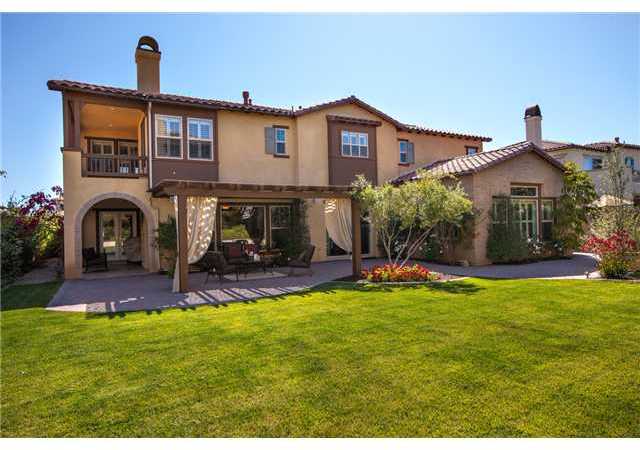 6989 Corte Langosta Carlsbad, CA 92009 - Photo 24 of 25 By day, large open grassy space in the rear yard...plenty of room for a pool if that is what you desire.