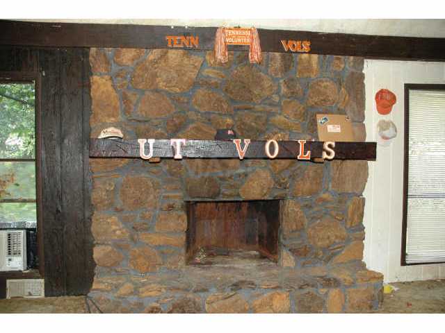 12540 Macon Road Collierville, TN 38017 - Photo 5 of 5 GORGEOUS FIREPLACE! BUILT WITH STONE FROM HISTORIC SHILOH NATL PARK CHURCH. THE MANTLE IS A BEAM FROM THE CHURCH!