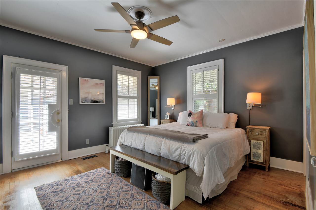 3971 Walnut Grove Road Memphis, TN 38111 - Photo 9 of 25 The spacious MASTER BEDROOM SUITE features RENOVATED BATH with Granite Vanity, Walk-In Closet, and Exterior Door to Incredible Rear Grounds