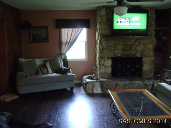 337 Lobelia Road St. Augustine, FL 32086 - Photo 7 of 16 family room with fireplace