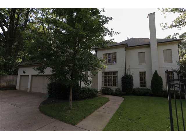 4401 Normandy Road Memphis, TN 38117 - Photo 2 of 21 3 car garage, extra driveway space, wrought iron automatic gate and beautiful side yard for views from the kitchen and breakfast room!