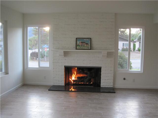 9202 Inverness Road Santee, CA 92071 - Photo 13 of 25 Spacious light & bright living room with new wood plank-look ceramic tile floor.