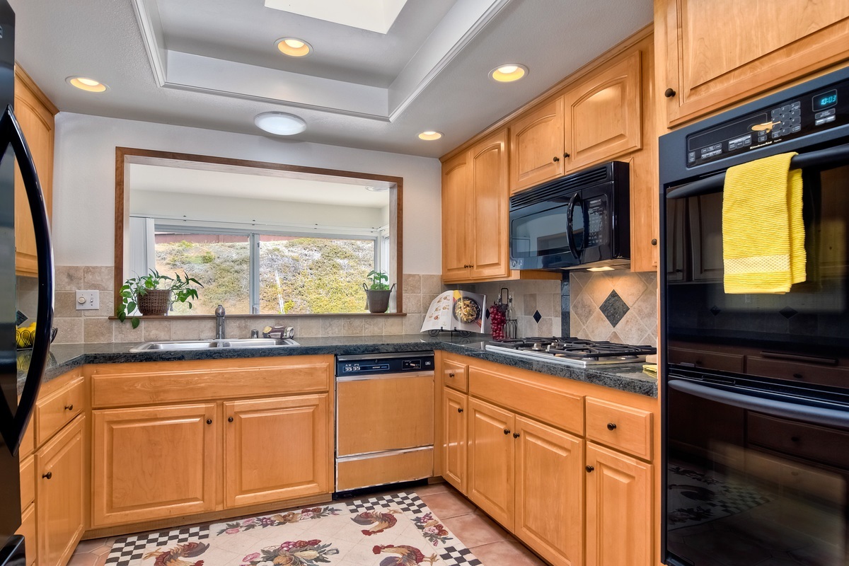 1764 Ivy Road Oceanside, CA 92054 - Photo 13 of 25 View to the Sun Room from the kitchen.