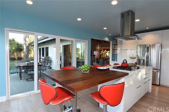 12 Harbor Sight Drive Rolling Hills Estates, CA 90274 - Photo 7 of 56 Kitchen with patio/yard access and living room beyond