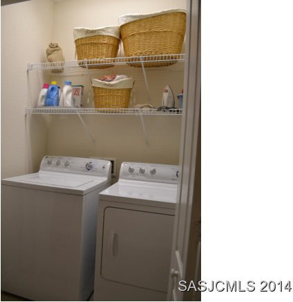 215 Bayberry Circle St. Augustine, FL 32086 - Photo 18 of 24 Upstairs Laundry/storage