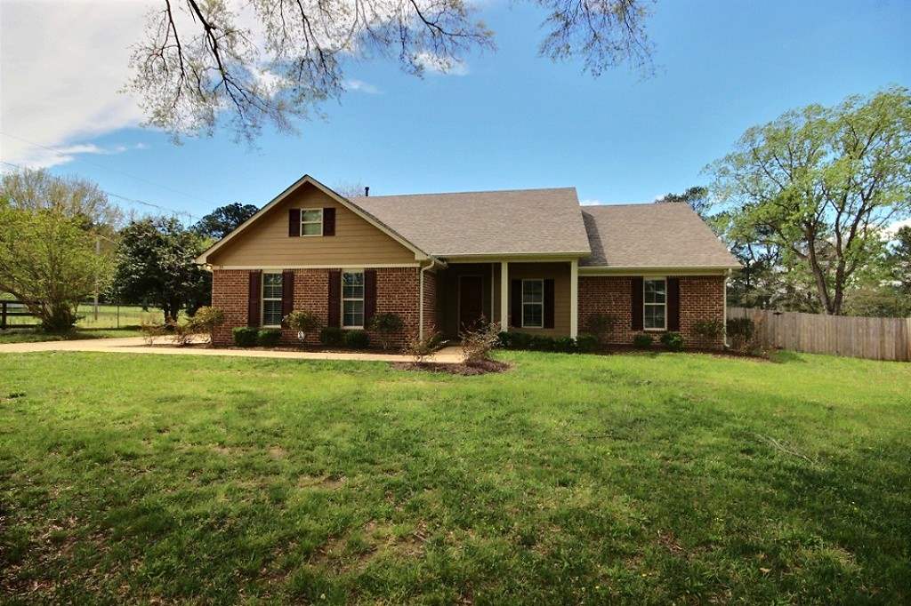 315 Poplar Acres Road Piperton, TN 38017 - Photo 1 of 15 Wow! Awesome newer home (built in 2016). 3 BR, 2 BA, open plan. All on one level! 1 acre fenced yard. Granite counter tops and hardwood floors throughout.