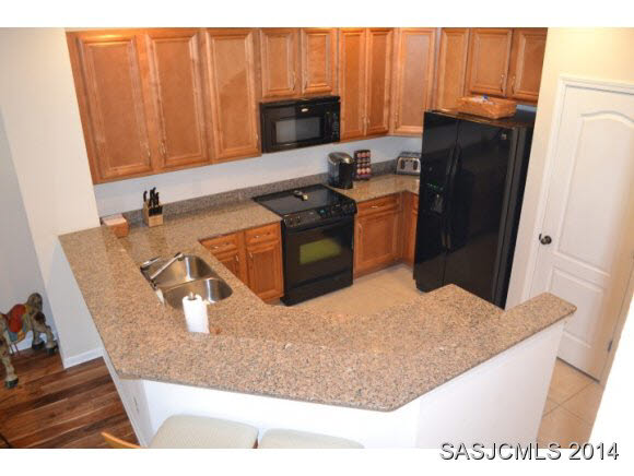215 Bayberry Circle St. Augustine, FL 32086 - Photo 7 of 24 Granite/ 42" Wood Cabinetry