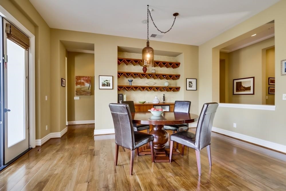 736 Caudor Street Encinitas, CA 92024 - Photo 6 of 25 Dining room with 20 bottle wine refrigerator and multiple French Doors bringing the outdoors in!