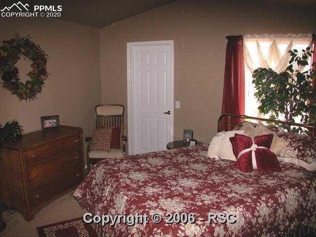 3835 Strawberry Field Grove, Unit H Colorado Springs, CO 80906 - Photo 4 of 8 Master Bedroom