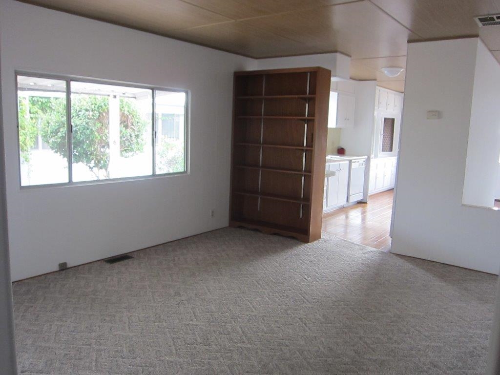 1925 Otay Lakes Road, Unit 87 Chula Vista, CA 91913 - Photo 10 of 25 The manufacturer called this an formal dining room, but in today's world it might be used as an office.