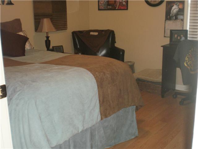 2716 Roughedge Road Covington, TN 38019 - Photo 12 of 22 Nice, big room with large closet, laminate floors, and a ceiling fan