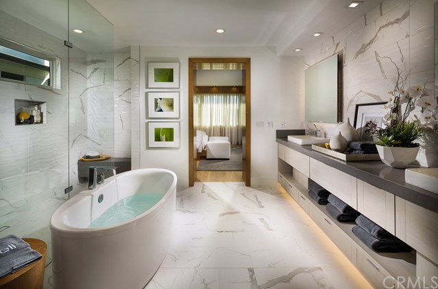65 Lunar Irvine, CA 92618 - Photo 6 of 17 Master Bath. Photo of model home not actual home for sale.