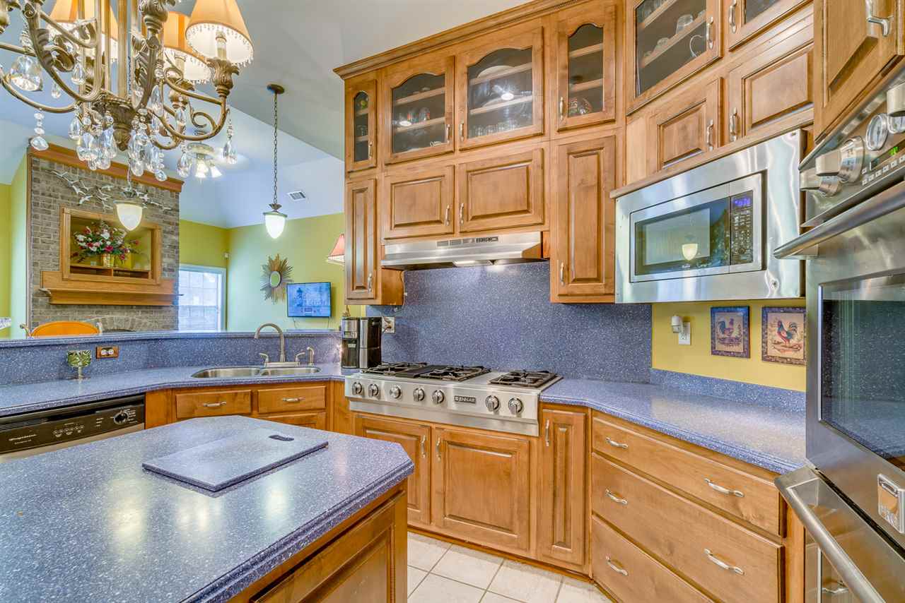 1005 Robertson Road Memphis, TN 38127 - Photo 7 of 25 This marvelous Kitchen is a chef's delight, featuring ample Corian Countertops, Island, Stainless Steel package, Double Ovens, Warmer, Microwave, Ice Maker, and a 48 inch built-in Refrigerator!