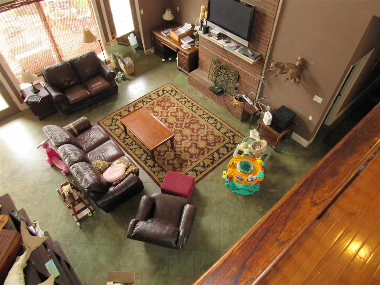 7225 Deadfall Road Arlington, TN 38002 - Photo 7 of 17 Large Den with vaulted ceiling, wood burning fireplace with gas starter.