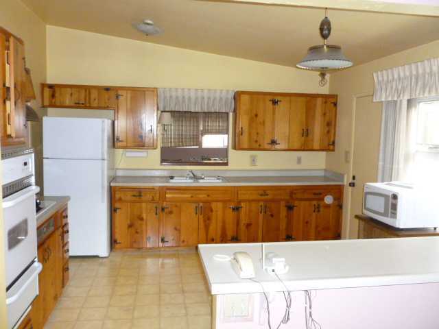 2851 Murray Ridge Road San Diego, CA 92123 - Photo 2 of 12 Large sunny kitchen! Refrigerator is included! Rarely used stove/oven & stove top! Original cabinets but in excellant condition!