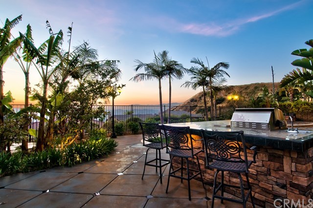 2148 Sageleaf Circle Corona, CA 92882 - Photo 5 of 74 More views from the outdoor kitchen. The outdoor kitchen has burners and seating for 10 people.