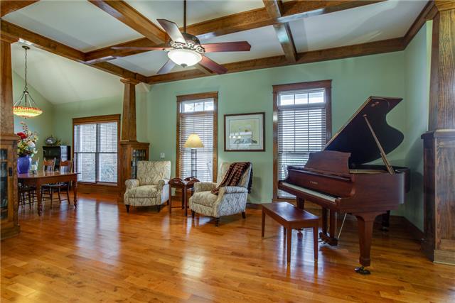 13920 Patterson Road College Grove, TN 37046 - Photo 10 of 30 The formal living room to the right features a coffered ceiling in addition to those beautiful hardwood floors.