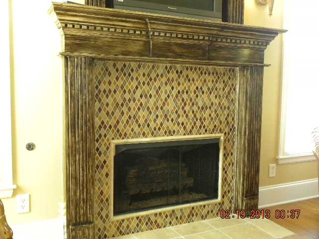 973 Fall Springs Road Collierville, TN 38017 - Photo 16 of 24 Beautiful mantel and tiles in the Hearth room