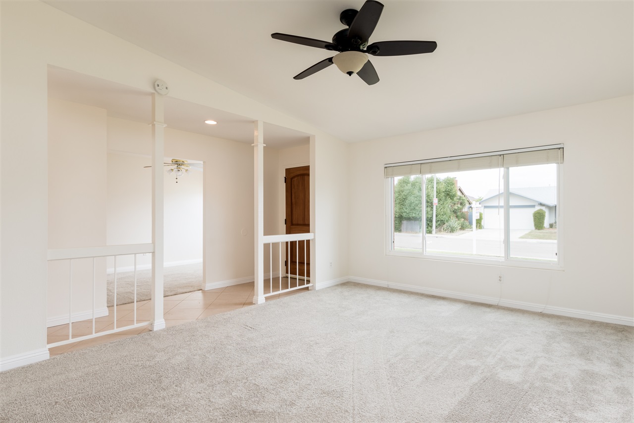 10312 Molino Road Santee, CA 92071 - Photo 3 of 25 Very large living room, great for the perfect seating arrangements and conversation areas.
