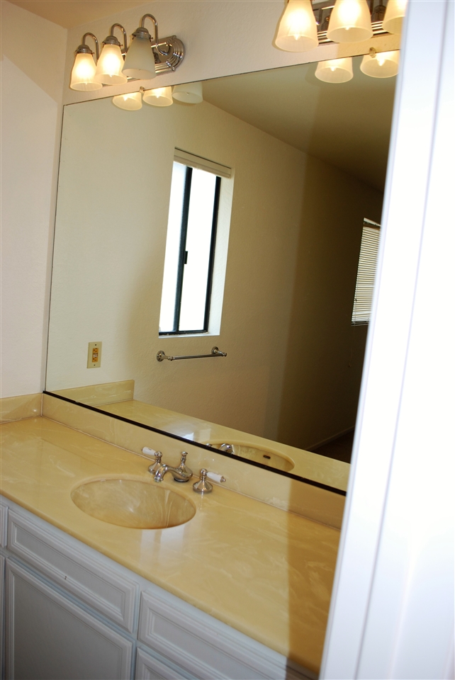 2372 Altisma Way, Unit C Carlsbad, CA 92009 - Photo 13 of 16 Vanity bedroom 2