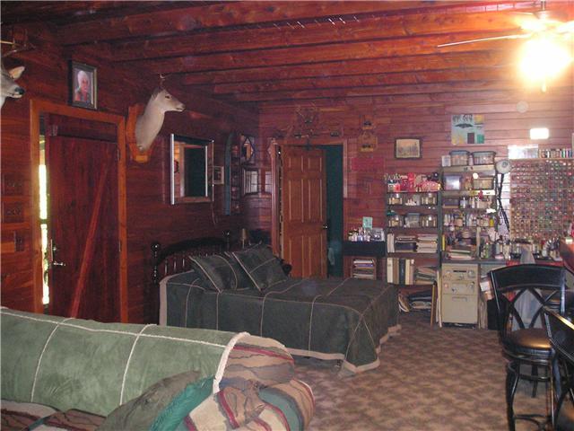 Cedar walls, cedar floors covered with carpet.