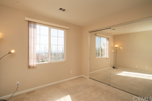 5473 Stoneview Road Rancho Cucamonga, CA 91739 - Photo 42 of 56 Bedroom with mirrored closet doors