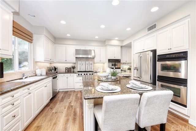 7 Wickford Lane Ladera Ranch, CA 92694 - Photo 8 of 36 Newly painted cabinets and stainless appliances