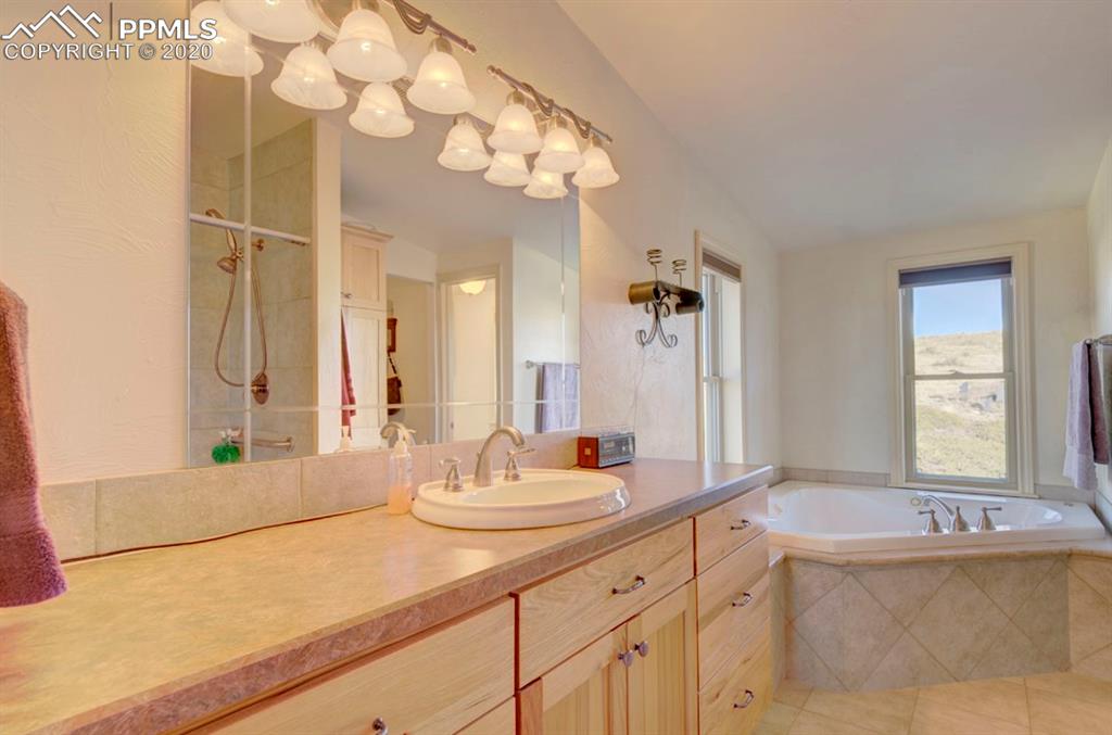 3235 South Meridian Road Colorado Springs, CO 80929 - Photo 26 of 36 Master Bathroom