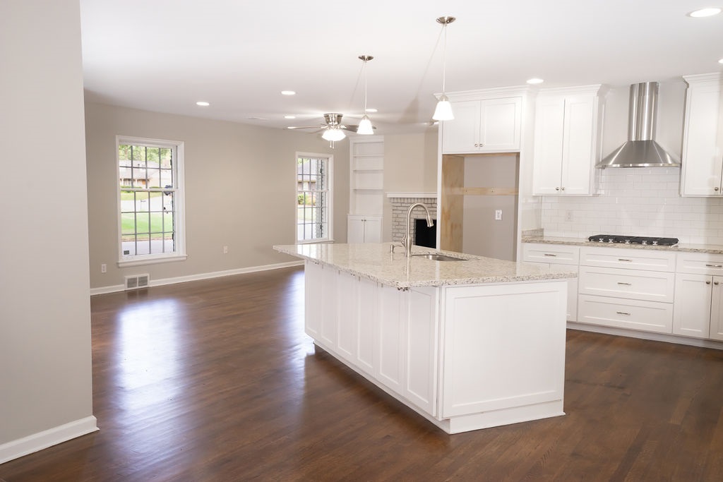 4 Fernway Road Memphis, TN 38117 - Photo 8 of 23 New open kitchen with granite counters, custom built counters and ss appliances.