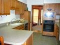 154 Walnut Ridge Lane Memphis, TN 38018 - Photo 6 of 7 Tile floor, solid surface countertops, newer appliances