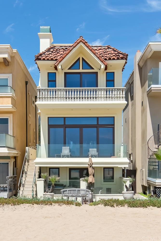 69 Surfside Avenue, Unit A Surfside, CA 90743 - Photo 1 of 1 Back side of the house from the sand. Outside newly painted.